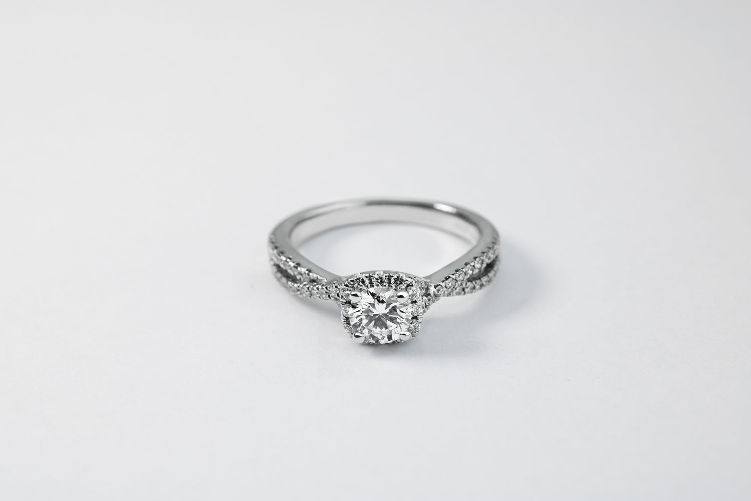Round Ring with Halo and Braided Pavé